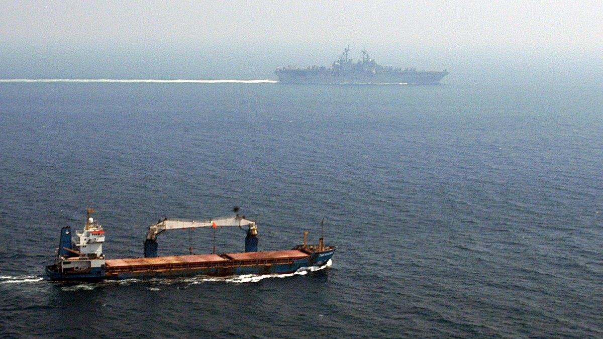 Iran's Revolutionary Guards say four oil tankers hit mines and caught fire in the Strait of Hormuz
